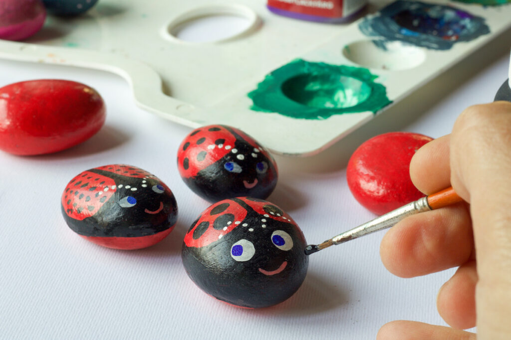 painted stones as ladybugs